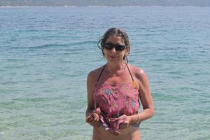 Откровенные снимки красивой итальянки в купальнике и без на пляже - фото #7