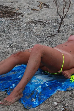 Woman Sunbathes Nude After Taking Off Yellow Bikini — photo 19